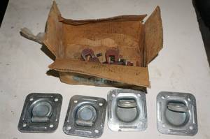 lot 104 image: Tie Down Plates and Clamps