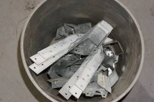 lot 123 image: Bucket of Metal Hangers