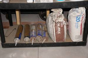 lot 200 image: Contents of Shelf - Liquid Nails, Mortar