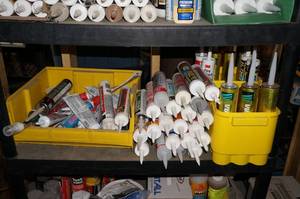 lot 202 image: Contents of Shelf - Liquid Nails, Silicone
