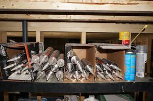 lot 204 image: Contents of Shelf - Window, Door, Siding Sealant