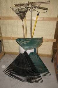 lot 276 image: Barrel of Rakes and Rake Heads