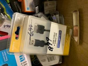 lot 58 image: ASSORTED ELECTRONICS POWER CORDS AND CASES FOR OLDER PHONES