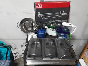 lot 22 image: 3-Piece Server, Griddle, 3-Trivets, Metal Cookie Cutters, Chocolate Fountain, Water Filter Pitchers (Includes Tote Bin With Lid (106 Qt.)