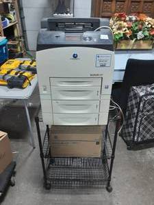 lot 70 image: Konica Minolta Bizhub 40P Printer Works. Comes With Extra Toner Cartridge & Shelf On Wheels