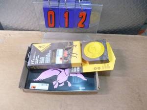 Flat of dog vest & duck license plate. As shown.