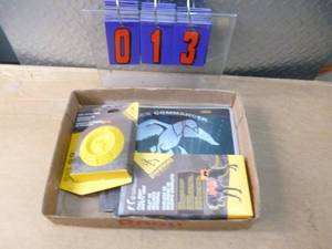 Flat of dog vest & duck license plate. As shown.