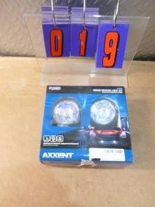 Pair of new driving lights with halogen bulbs. As shown.