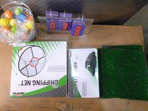 Flat of new golf accessories. As shown.