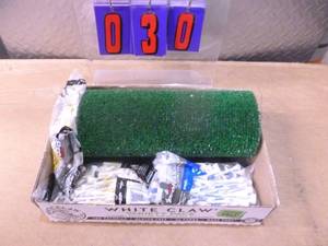 Flat of golf accessories. As shown.