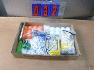Flat of golf accessories. As shown.