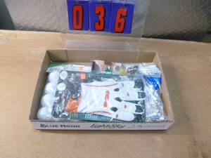 Flat of golf accessories. As shown.
