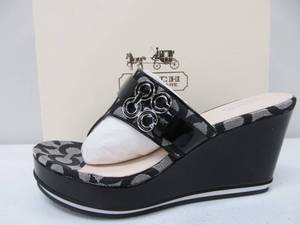 lot 93 image: Brand New COACH Thong Gypsy Wedge Sandals - Black- Size 8.5