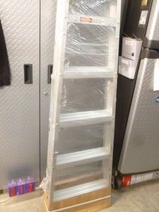 6 aluminum step ladder. New. As shown.