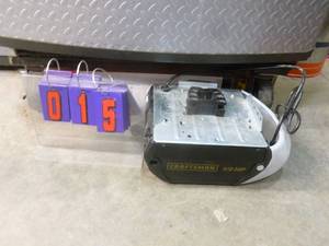 Craftsman 12 hp garage door opener. Chain drive. Power head only. Untested. Appears new. As shown.