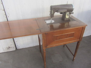 lot 138 image: Kenmore Cabinet Sew Machine