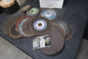 lot 84 image: GRINDER BLADES AND STONES  WINDOW ASHING BRUSHES FOR CARS