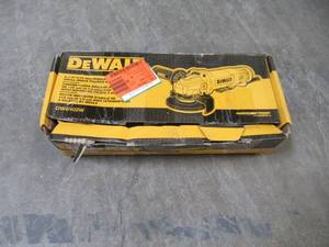 lot 18 image: DEWALT 11 Amp 4-12 in. Angle Grinder DWE402W