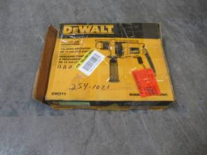 lot 19 image: DEWALT 12 in. Variable Speed Reversible Hammer Drill DW511