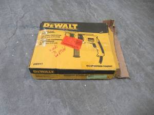 lot 21 image: DEWALT 12 in. Variable Speed Reversible Hammer Drill DW511