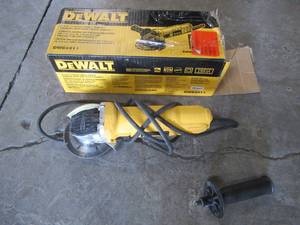 lot 58 image: Dewalt 7 Amp 4-12 in. Small Angle Grinder with 1-Touch Guard, DWE4011 - Slightly Used..