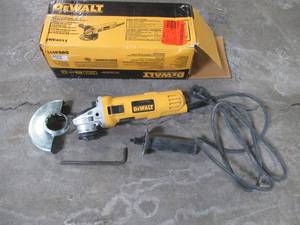 lot 60 image: Dewalt 7 Amp 4-12 in. Small Angle Grinder with 1-Touch Guard, DWE4011 - Slightly Used.