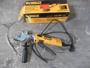 lot 61 image: Dewalt 7 Amp 4-12 in. Small Angle Grinder with 1-Touch Guard, DWE4011 - Slightly Used.