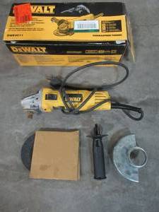 lot 90 image: Dewalt 7 Amp 4-12 in. Small Angle Grinder with 1-Touch Guard, DWE4011 - Slightly Used.