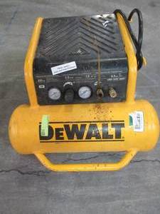 lot 155 image: Dewalt 4.5 Gal. Portable Electric Air Compressor, D55146 - Motor Works, Does not createhold Pressure - USED - For Parts or Restore.