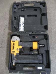 lot 186 image: DEWALT 18-Gauge Pneumatic Brad Nailer, DWFP12233 - Slightly Used.