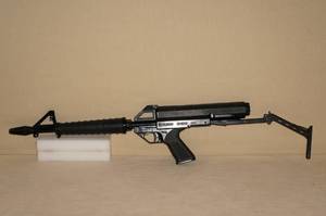 lot 7 image: Calico M-100 .22 LR Rifle with 100 Round Drum Magazine