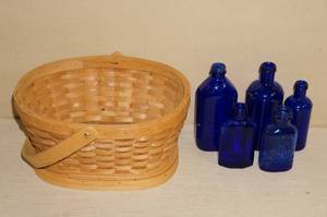 lot 37 image: Cobalt Blue Glass Bottles and a Basket