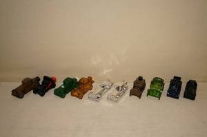 lot 22 image: 10 Assorted Vehicle Avon Collectors Bottles