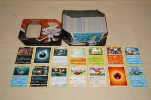 lot 63 image: Metal Tin of Pokemon Cards