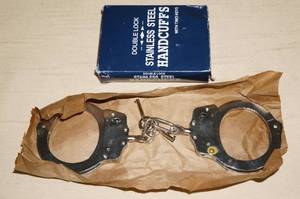 lot 100 image: Stainless Steel Handcuffs