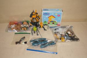 lot 115 image: Lego and Transformers Action Figures, Peppa Pig