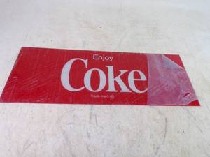 Never use Coca Cola sign with plastic still on front 9 12 x 25 34