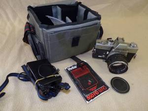 SRT101 Minolta Camera, Lens, Flash, and Camera Bag
