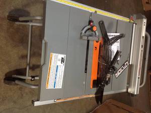 lot 34 image: Ridgid 10 in. Pro Jobsite Table Saw with Stand see pictures