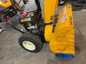 lot 44 image: 2X 26 in. 243 cc Two-Stage Gas Snow Blower with Electric Start, Power Steering and Steel Chute by Cub Cadet in working conditions