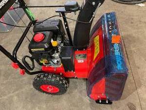 lot 45 image: 24 in. 212cc 2-Stage Electric Start Gas Snow Blower by PowerSmart in working conditions