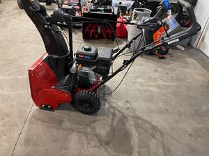 lot 48 image: SnowMaster 724 QXE 24 in. 212cc Single-Stage Gas Snow Blower by Toro in working conditions