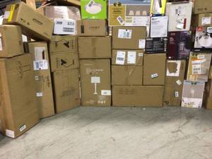 lot 1 image: Pallet with assorted Lightning various models and brands customer returns see pictures