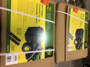 lot 7 image: Lot of 2 John Deere Rear Bagger 42 in open box not used see pictures