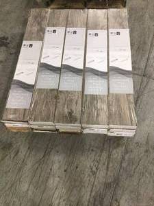 lot 32 image: Pallet with 12 cases Saratoga Hickory Amber 7 mm Thick x 7-23 in. Wide x 50-58 in. Length Laminate Flooring (24.17 sq. ft.  case) see pictures