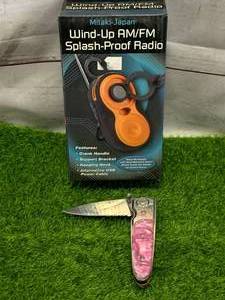 lot 126 image: Splashproof Radio & Serrated Knife