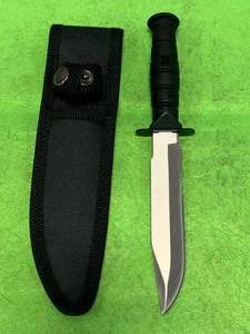 lot 132 image: Serrated Knife & Sheath