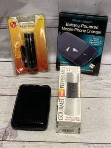 lot 178 image: Pepper Spray, Light, Phone Charger, Card Holder
