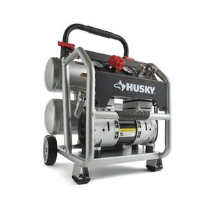lot 81 image: 4.5 Gal. Portable Electric-Powered Silent Air Compressor by Husky- open box not used -SEE PICTURES