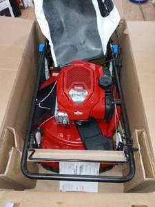 lot 100 image: Recycler 22 in. SmartStow High Wheel Variable Speed Walk Behind Gas Self Propelled Mower by Toro- open box slightly used SEE PICTURES